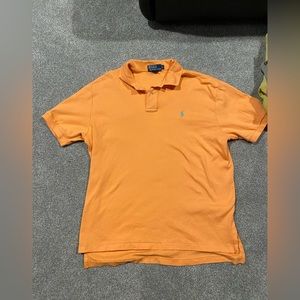 Ralph Lauren polo, gently worn, orange with turquoise horse. Size large.